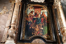 Madonna con santi e il banchiere. Gandolfino da Roreto